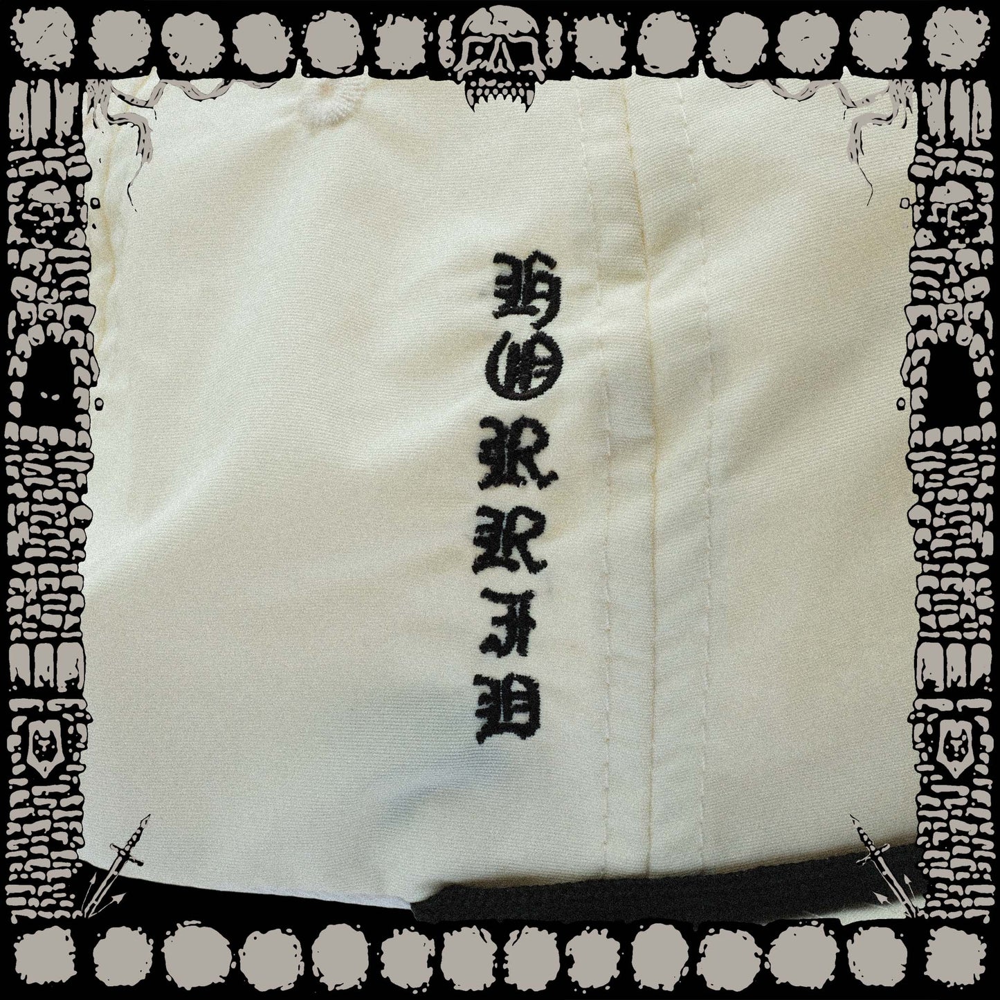 “BONE” COLORED NYLON ROPE DEATH SNAPBACK CAPS